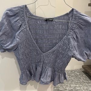 Blue crop top with puff sleeves